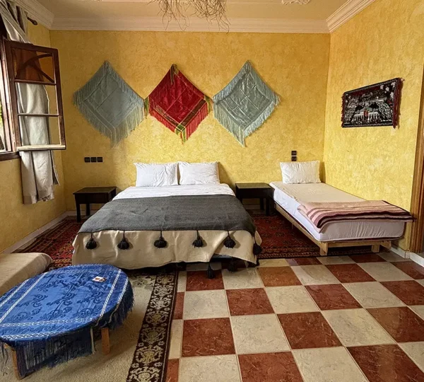 5_1 Double Bed + Single Bed + Private Bathroom 1