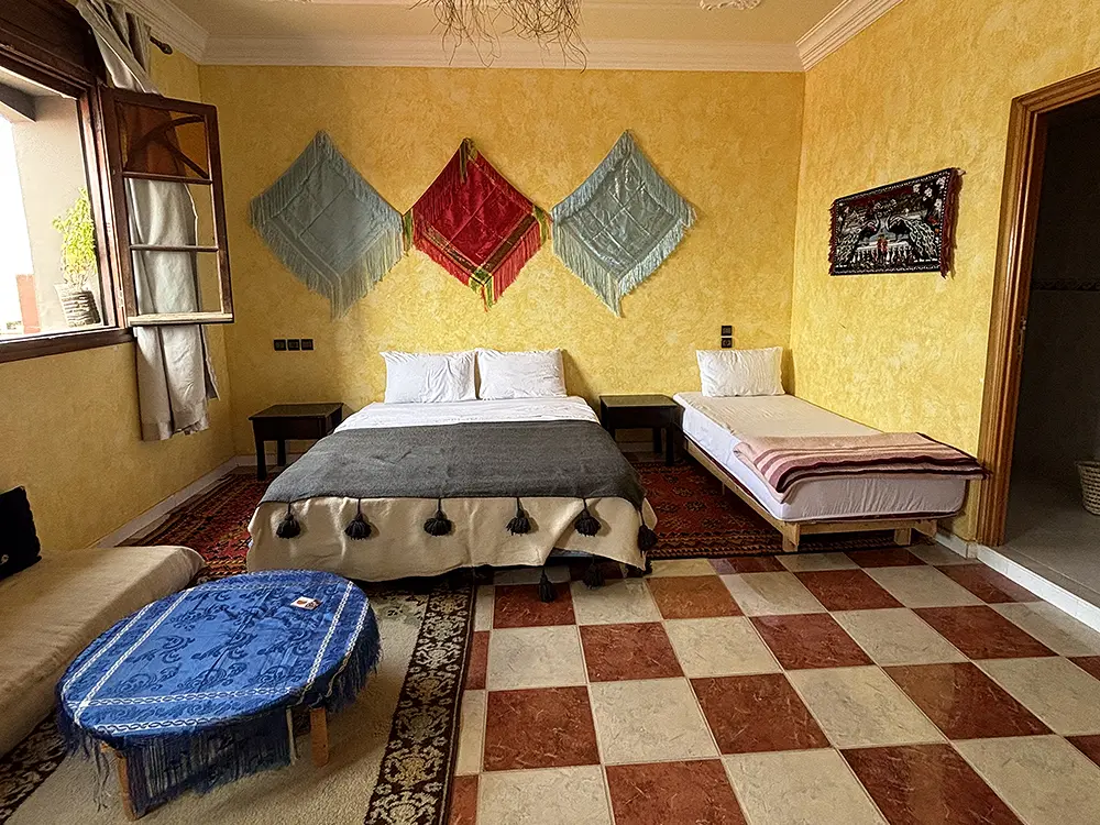 5_1 Double Bed + Single Bed + Private Bathroom 1